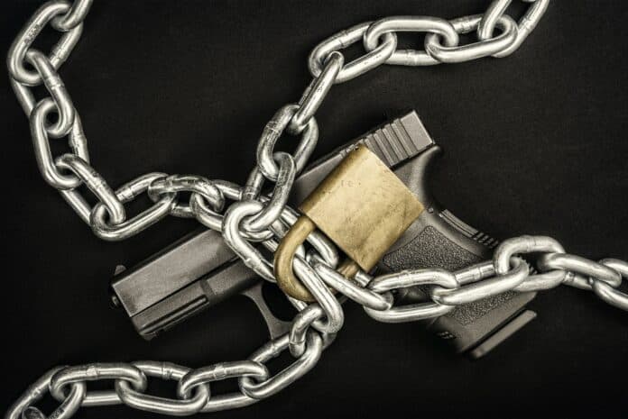 Chained up handgun